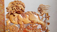 Классический тибетский лев. Резьба по дереву