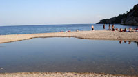 Пресный и соленый пляж, Олимпос
